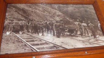 Old photos up in the train depicting history of laying the railway